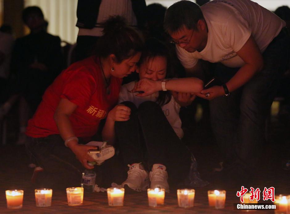 MH370航班失聯(lián)滿月 在京乘客家屬舉行祈?；顒?dòng)