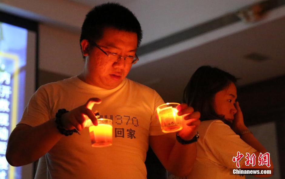 MH370航班失聯(lián)滿月 在京乘客家屬舉行祈福活動