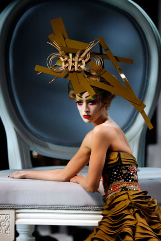 A model presents a creation by British designer John Galliano as part of French fashion house Dior's Spring-Summer 2007 Haute Couture collection in Paris, January 22, 2007. 