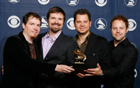 Members of Third Day, Mark Lee, Mac Powell, Tai Anderson and David Carr (L-R), hold the award for Best Pop/Contemporary Gospel Album, for